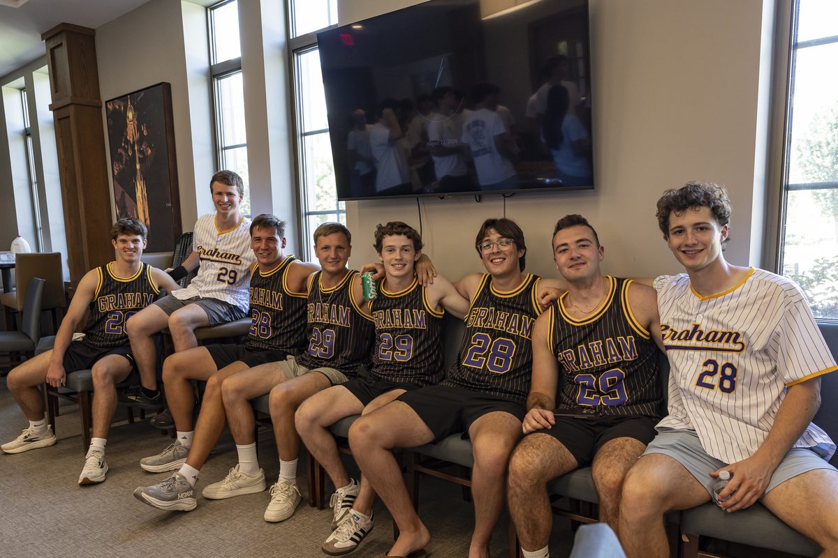 Royals in jerseys in the hall lounge